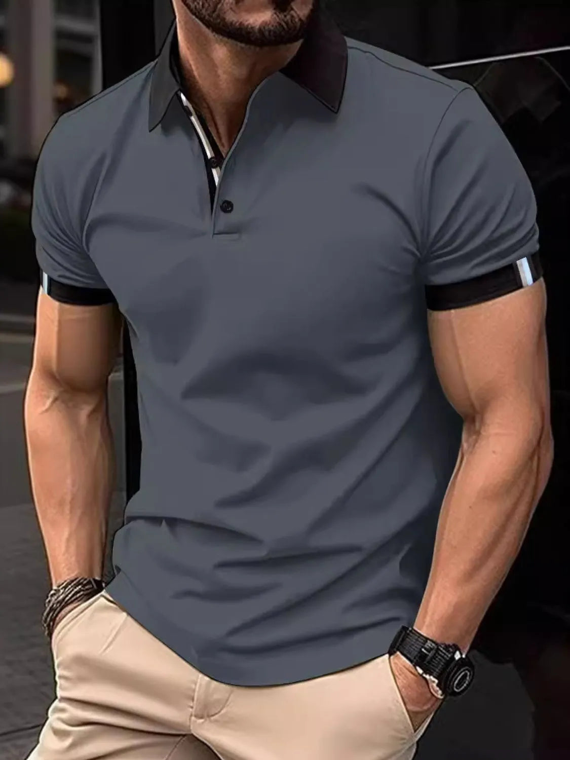 Dark Gray polo shirt with contrast collar and striped sleeve trim.