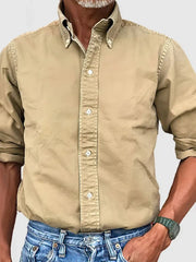 Khaki Oxford button-down shirt with relaxed fit and button collar.