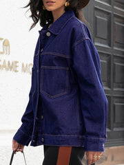 Dark oversized denim trucker jacket with contrast stitching and collared neck.