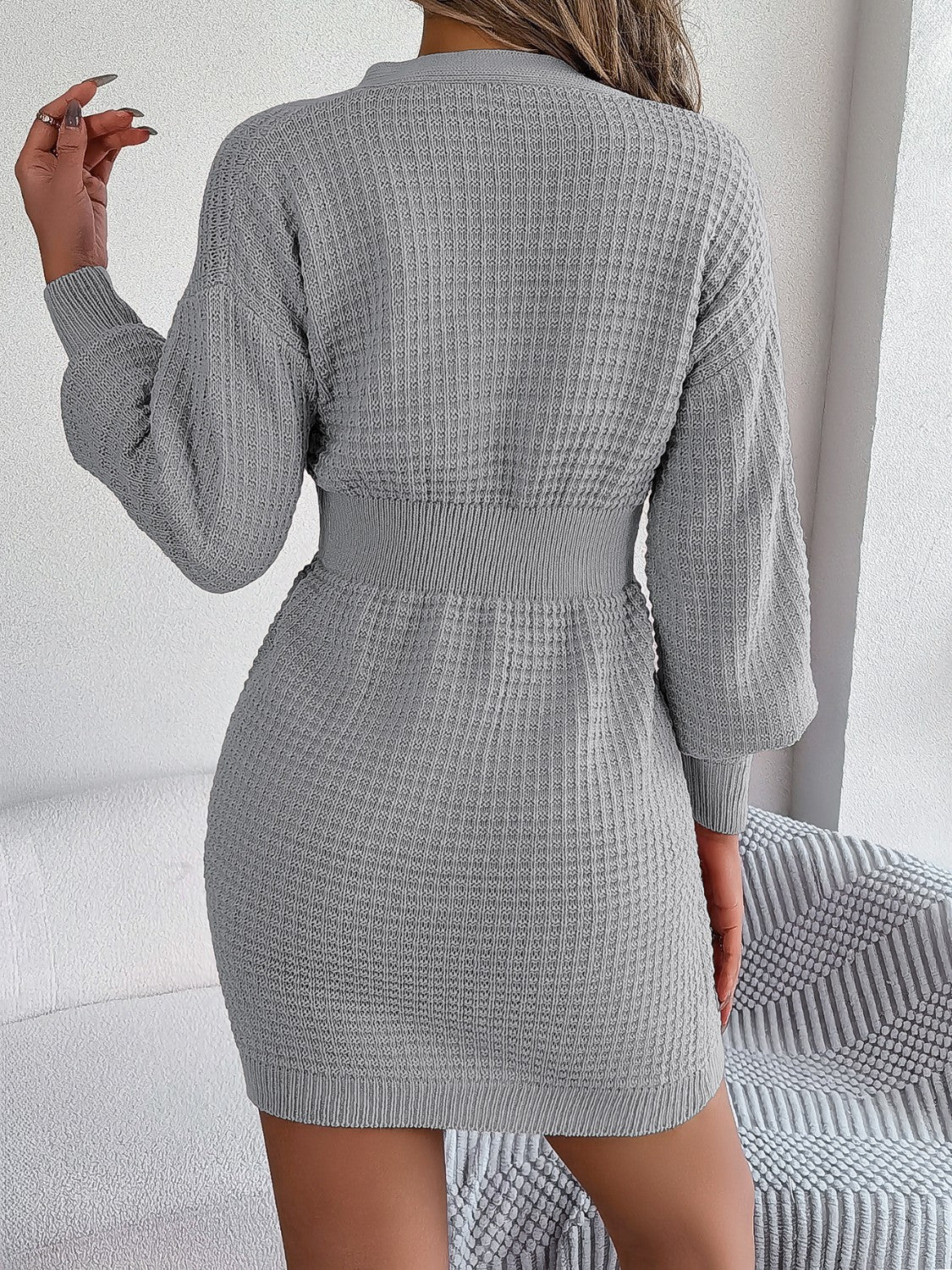 Cable knit button-front dress in charcoal with hourglass fit and long sleeves.