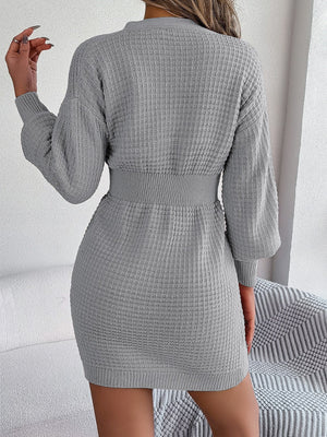 Cable knit button-front dress in charcoal with hourglass fit and long sleeves.