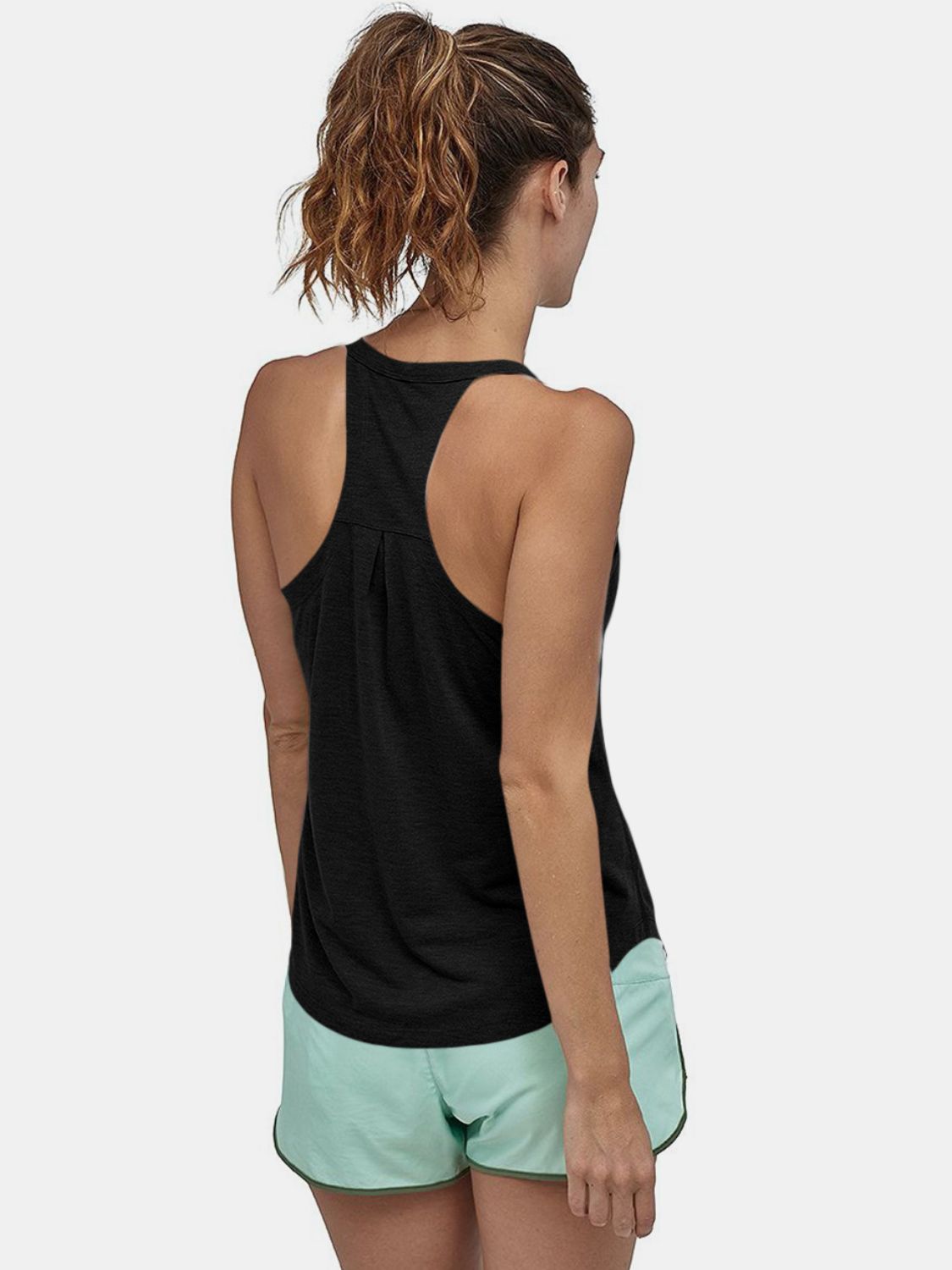 Black racerback tank top with pleated back detail.