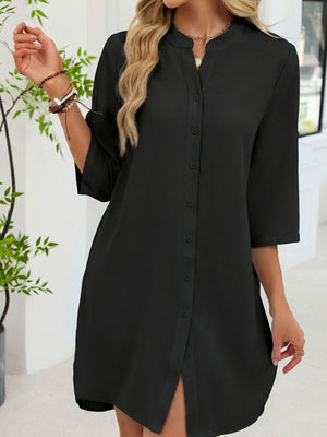 Black button-down shirt dress with band collar and 3/4 sleeves.