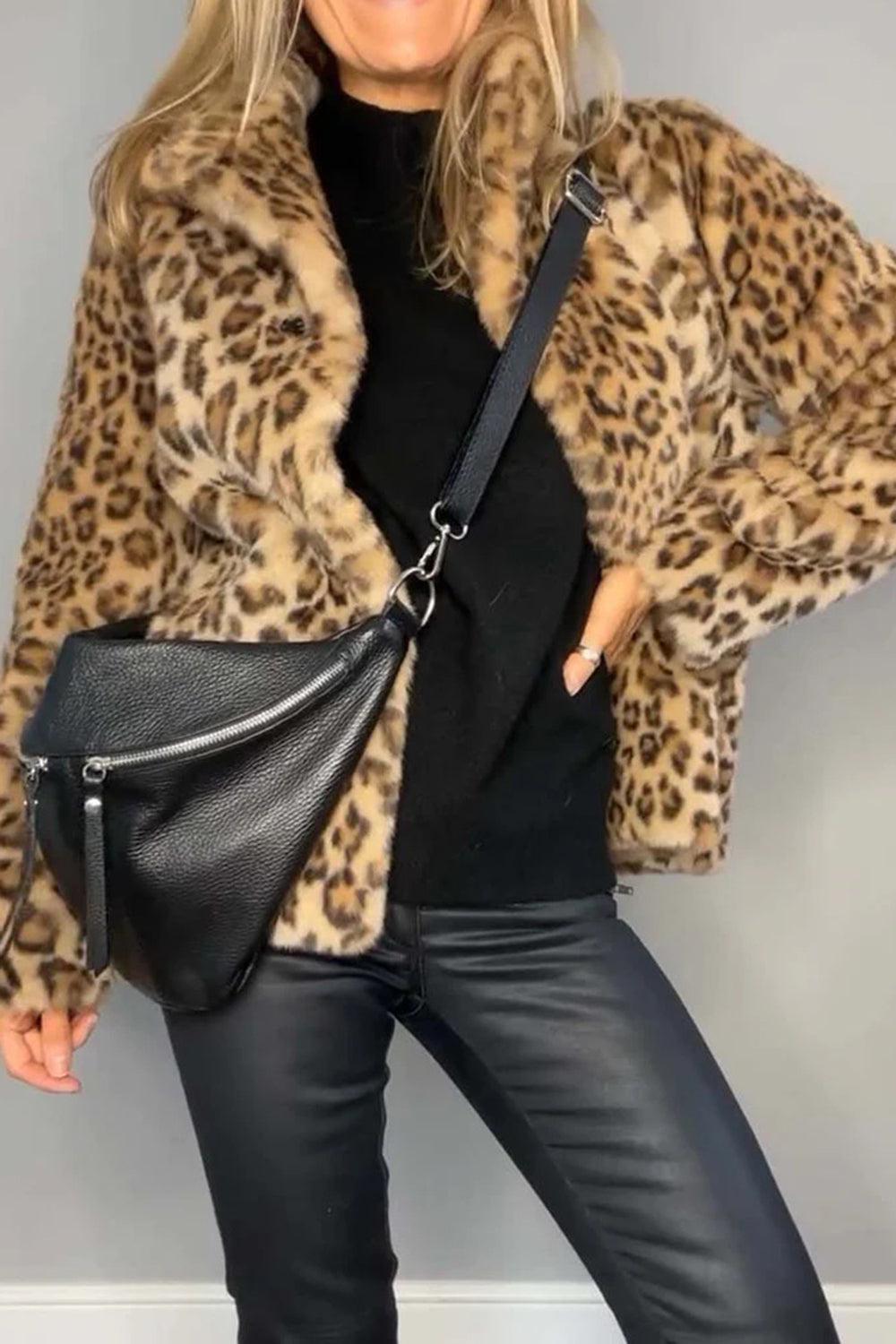 Leopard print faux fur collar coat with a black crossbody bag and black pants