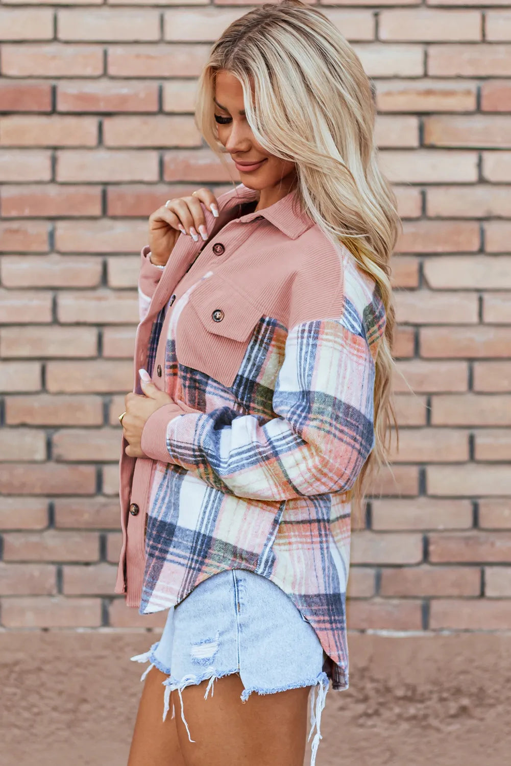 Colorblock plaid shacket in pale blush with ribbed texture and button details.