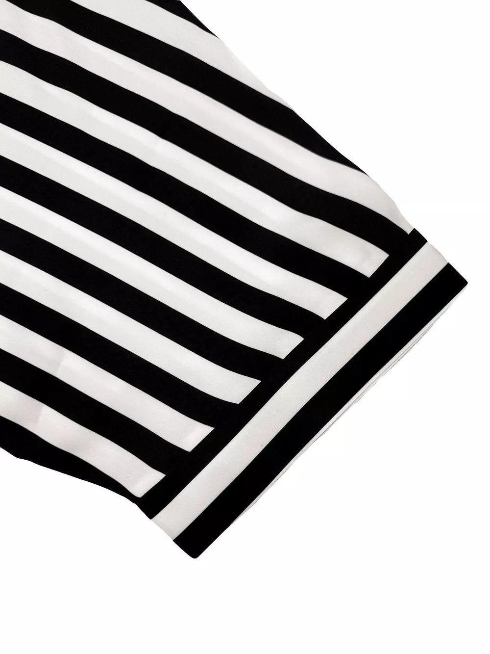 Black and white striped romper cover-up with collared neckline and button front detail.