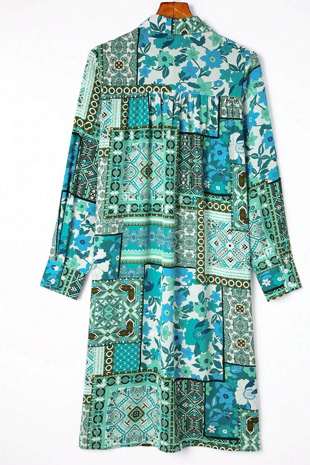 Patchwork print duster shirt jacket in blue and turquoise with floral and geometric patterns.