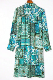 Patchwork print duster shirt jacket in blue and turquoise with floral and geometric patterns.
