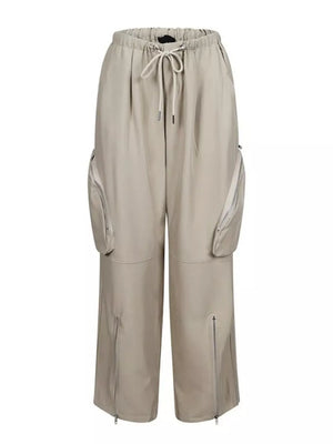 Drawstring Cargo Pants With Zipper Accents in Black, close-up detail