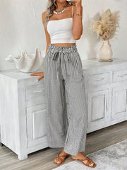 Striped paper bag maternity pants with a tie waist and wide leg
