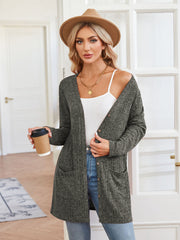 Textured ribbed knit button-down cardigan in Army Green with front pockets and a relaxed fit.