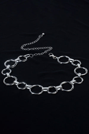 Silver linked circle waist chain belt with adjustable clasp and extender.