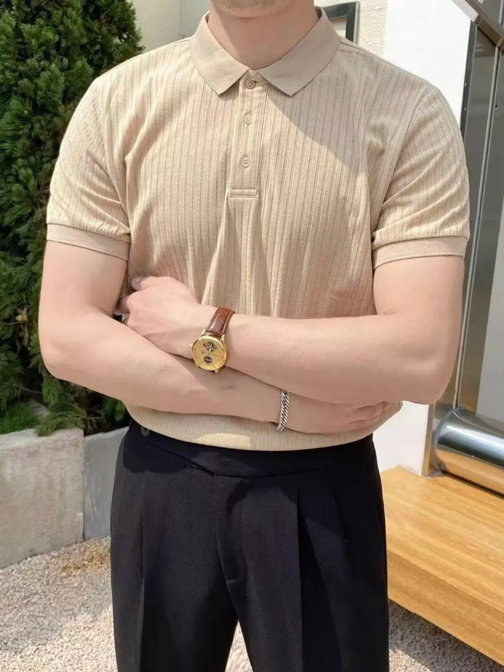 Coffee color ribbed cotton polo shirt with button details.