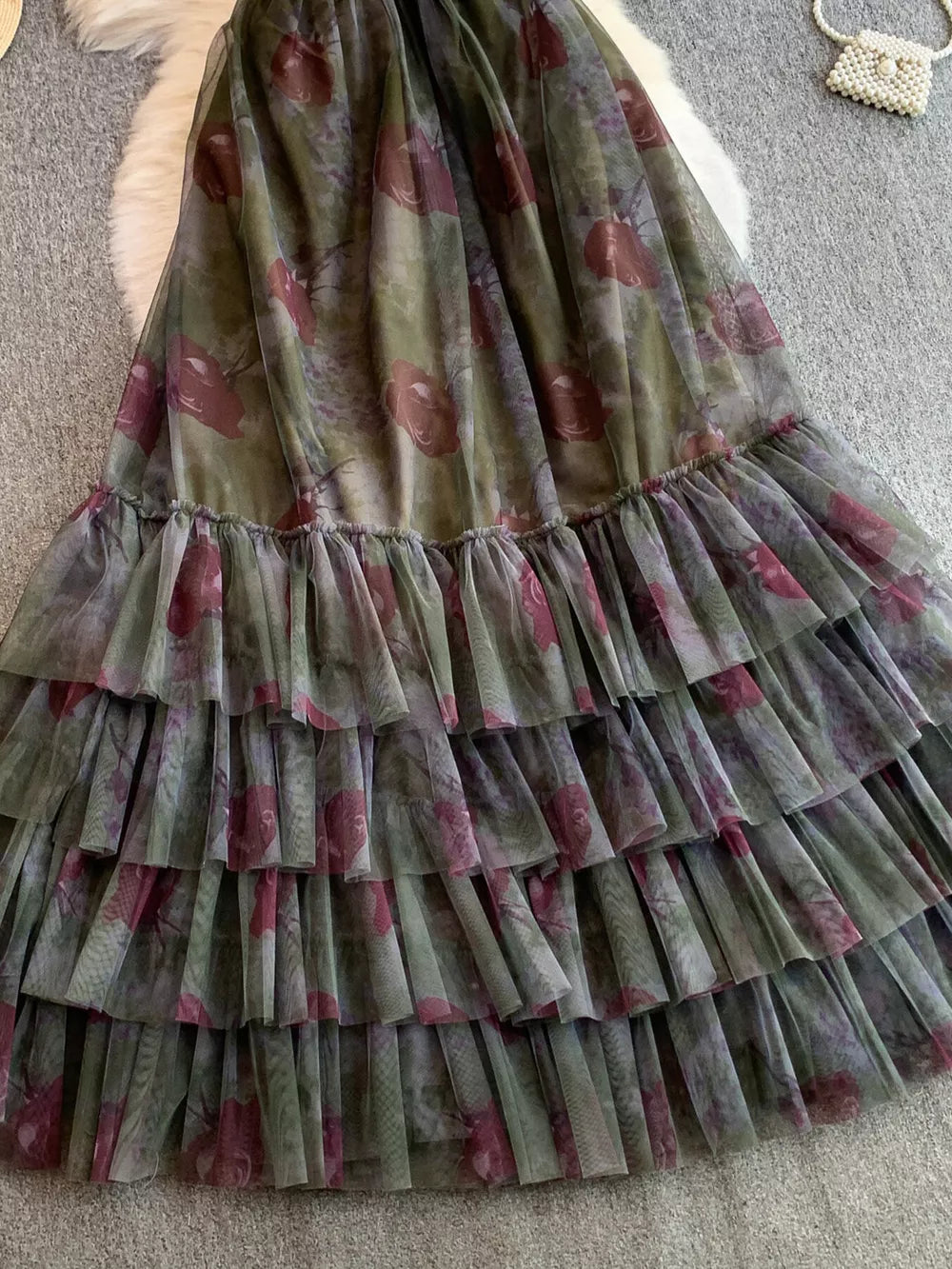 Romantic floral mesh maxi dress in Army Green with tiered ruffles and a sheer overlay.