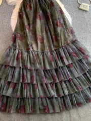 Romantic floral mesh maxi dress in Army Green with tiered ruffles and a sheer overlay.