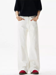 White wide-leg sweatpants with pockets, styled with a black top and red shoes.