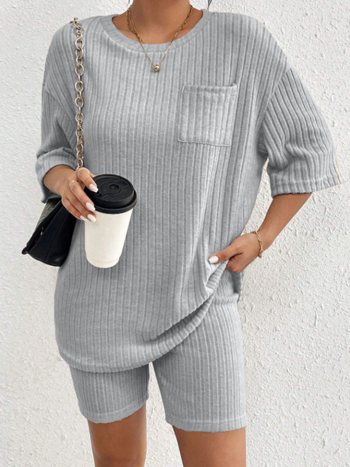 Light Gray ribbed lounge set with crew neck top and bike shorts.