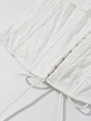 White eyelet tank top with corset detail and drawstring ties