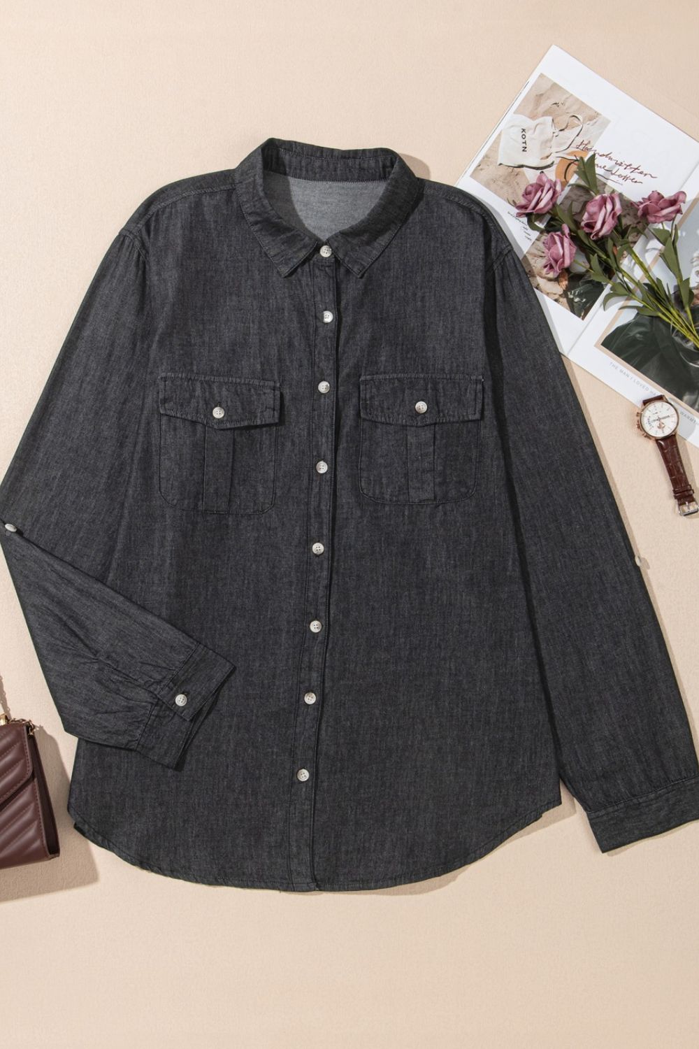 Relaxed black denim shirt with patch pockets and button front
