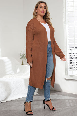 Oversized knit maxi cardigan in caramel with an open front and long sleeves.