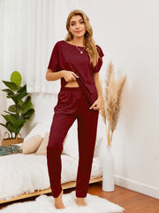 Burgundy loungewear set with short sleeve top and relaxed fit pants.