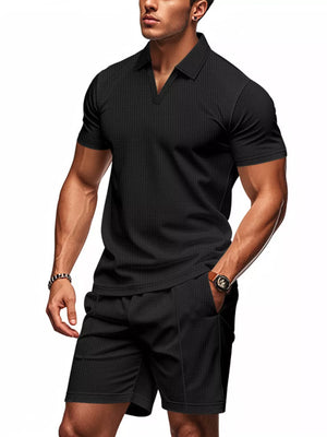 Black textured polo shirt and shorts ensemble for men, casual activewear set.