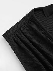 Black ruched V-neck romper with cinched waist detail