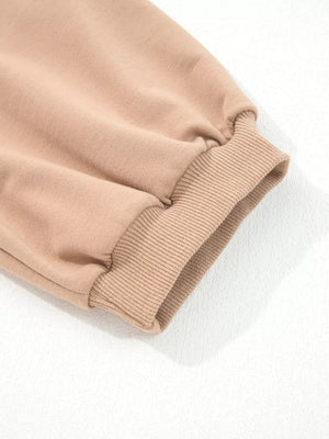 Braided puff sleeve dress in khaki with ribbed cuffs and gathered sleeve detail.