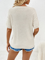 Cream textured knit t-shirt with short sleeves and boxy silhouette.