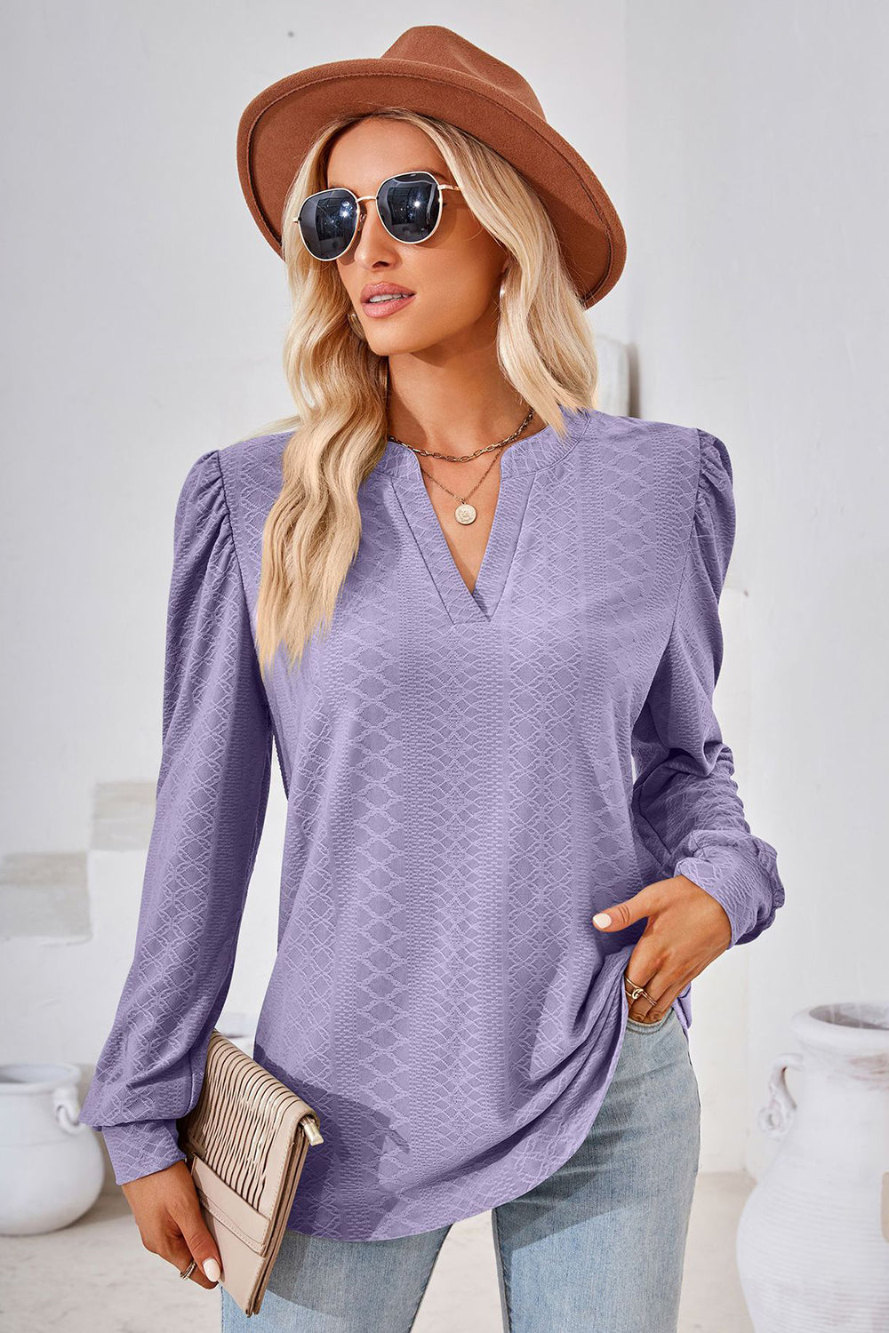 Lilac textured puff sleeve henley blouse with v-neck and long sleeves