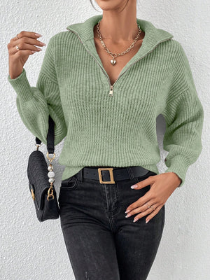 Matcha green ribbed knit sweater with a zip-up collar and balloon sleeves.