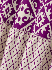 Tiered maxi skirt in purple and beige medallion print with ruffled tiers.