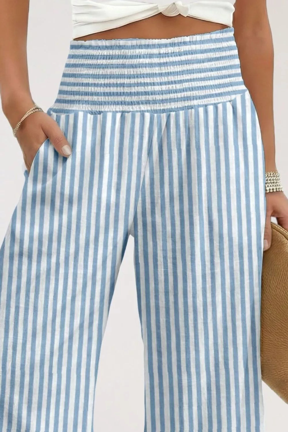 Blue and white striped maternity pants with smocked waist and pockets