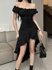 Black off-shoulder ruffled dress with asymmetrical hem and tie front detail.