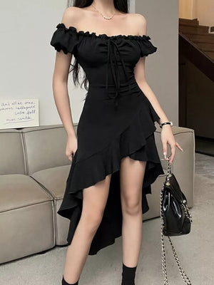Black off-shoulder ruffled dress with asymmetrical hem and tie front detail.