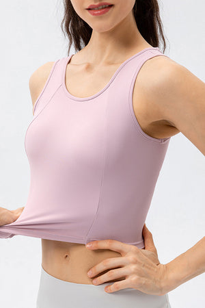 Lilac active crop top with sculpted seams and a scoop neckline.