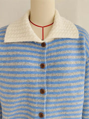 Blue and gray striped knit cardigan with a textured white collar and button front.