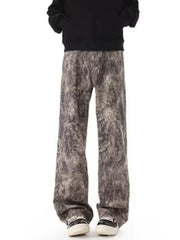 Men's abstract print wide leg jeans in cotton, featuring a grey and brown textured pattern.
