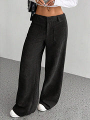 Black corduroy wide-leg utility trousers with front patch pockets.