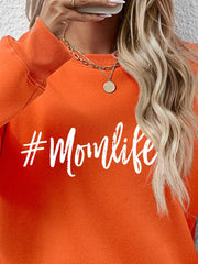 Crewneck sweatshirt in Pumpkin orange with white #Momlife graphic print
