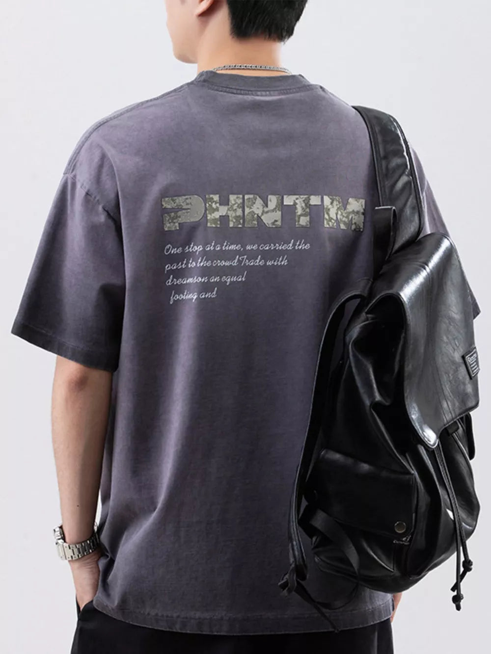 Men's dark gray cotton t-shirt with round neck and graphic back print.