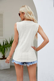 White embroidered trim perforated knit tank top with a round neckline.