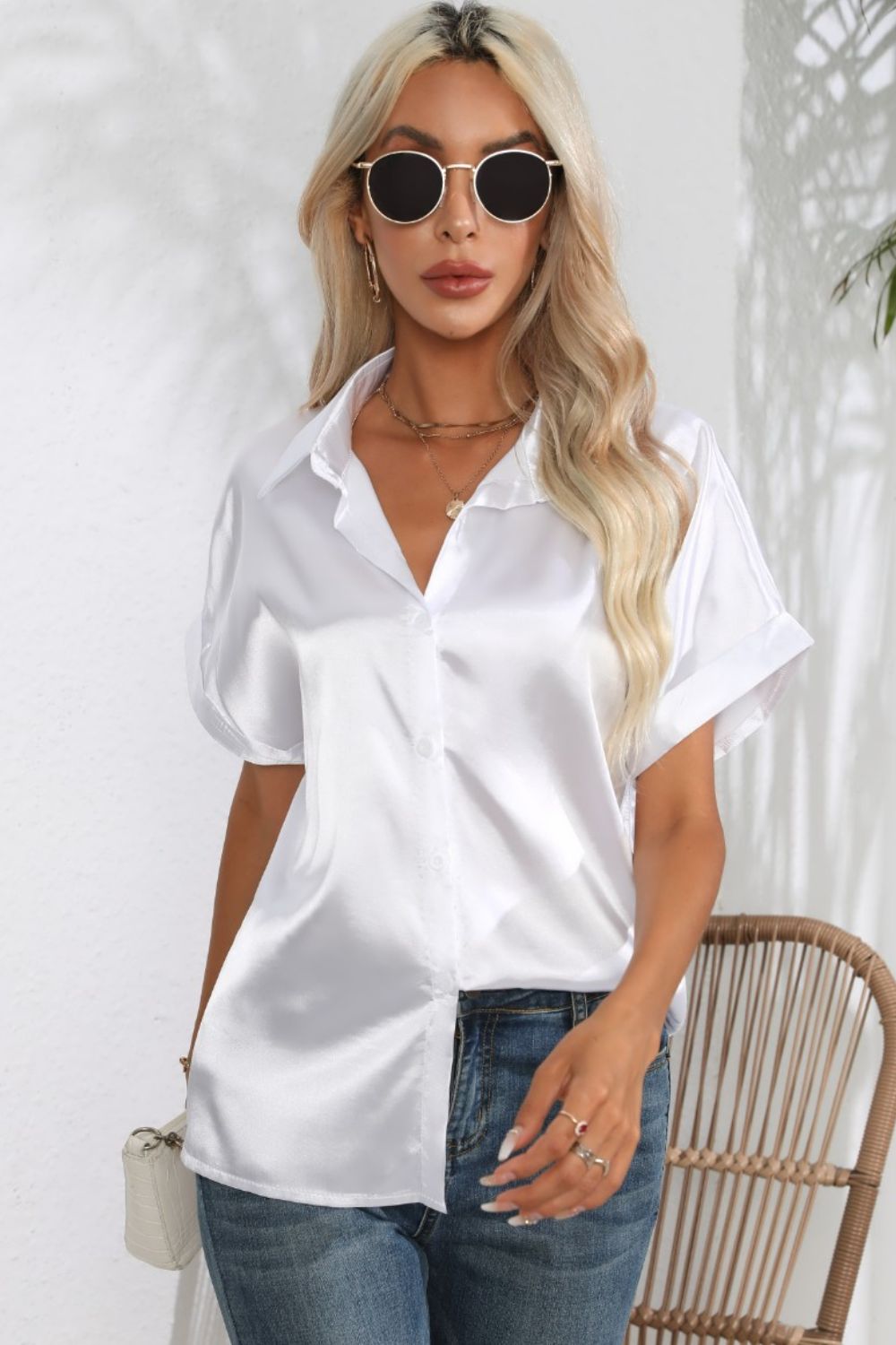White satin cuffed sleeve button-down blouse with a relaxed fit.