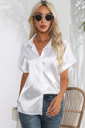 White satin cuffed sleeve button-down blouse with a relaxed fit.