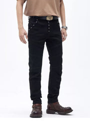Black cotton slim fit moto jeans with ribbed panels and button fly.