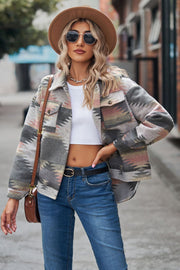 Southwestern print overshirt jacket in gray with pink and tan accents, button front, and chest pockets.