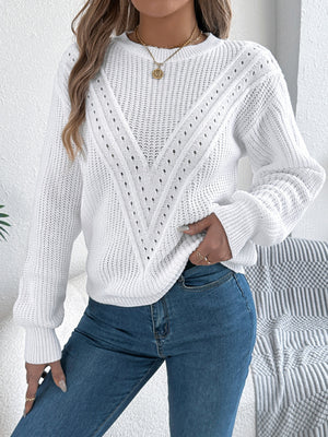 White chevron knit sweater with eyelet details and crew neck.