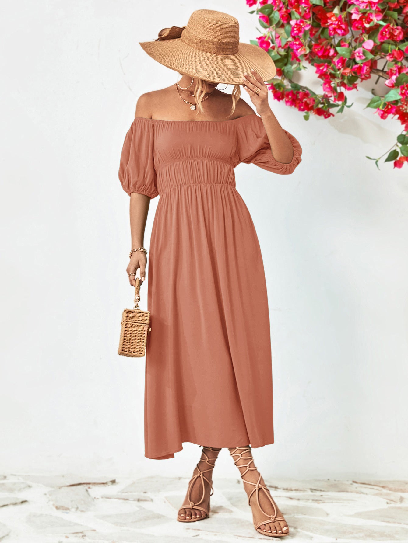 Gathered bodice off-shoulder midi dress in dusty pink with balloon sleeves and A-line skirt.