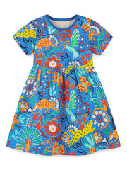 Toddler blue cotton dress with whimsical animal and floral print, short sleeves, round neck.