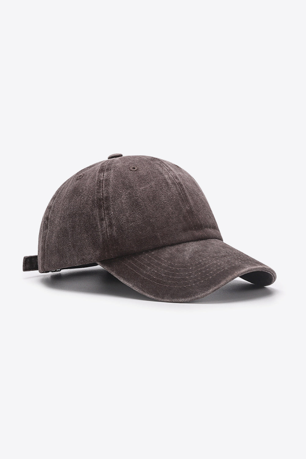 Washed cotton baseball cap in brown with adjustable strap and stitched details.